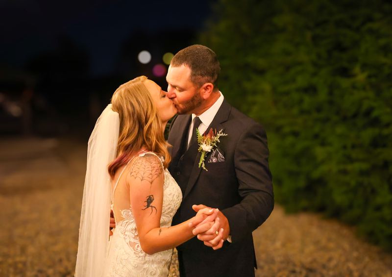 Couple kissing during an evening dance